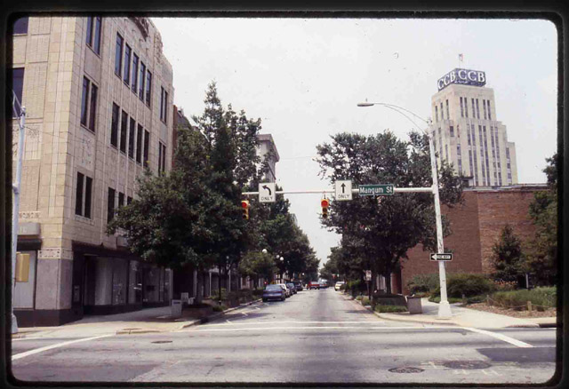 Corner of Mangum and West Main streets Looking West, 1996