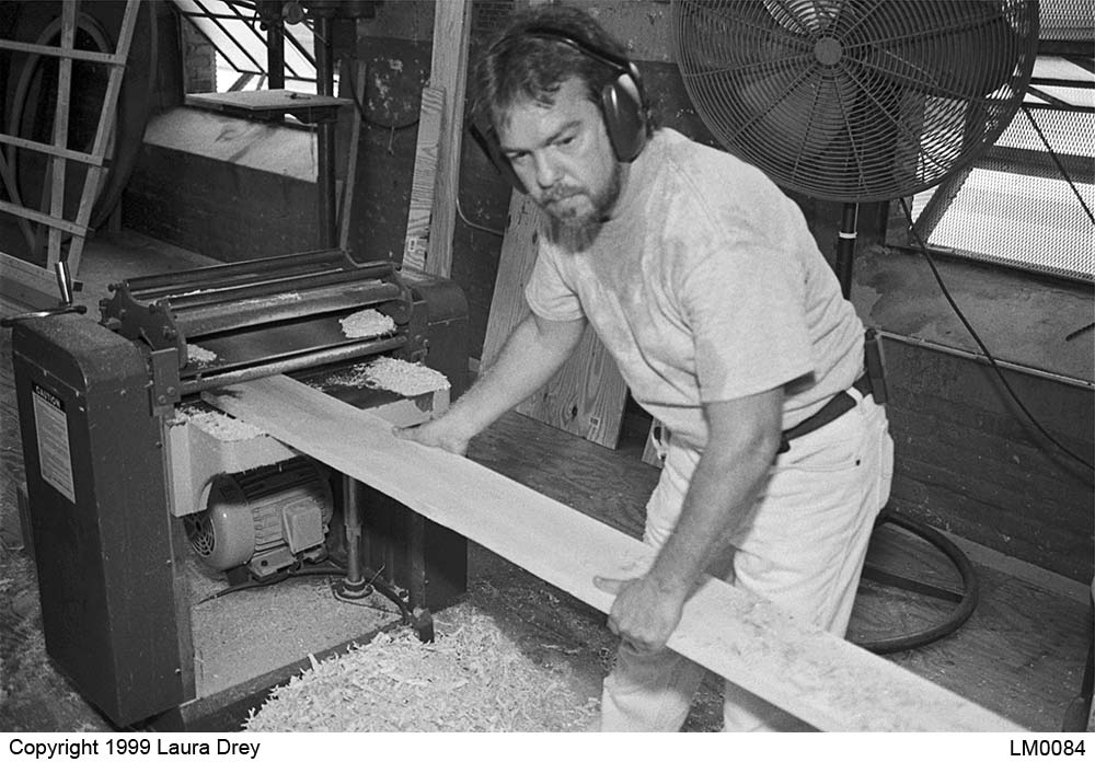 image of employee in carpentry shop