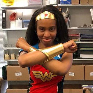 Donielle, children's librarian at Southwest Regional, dressed as Wonder Woman